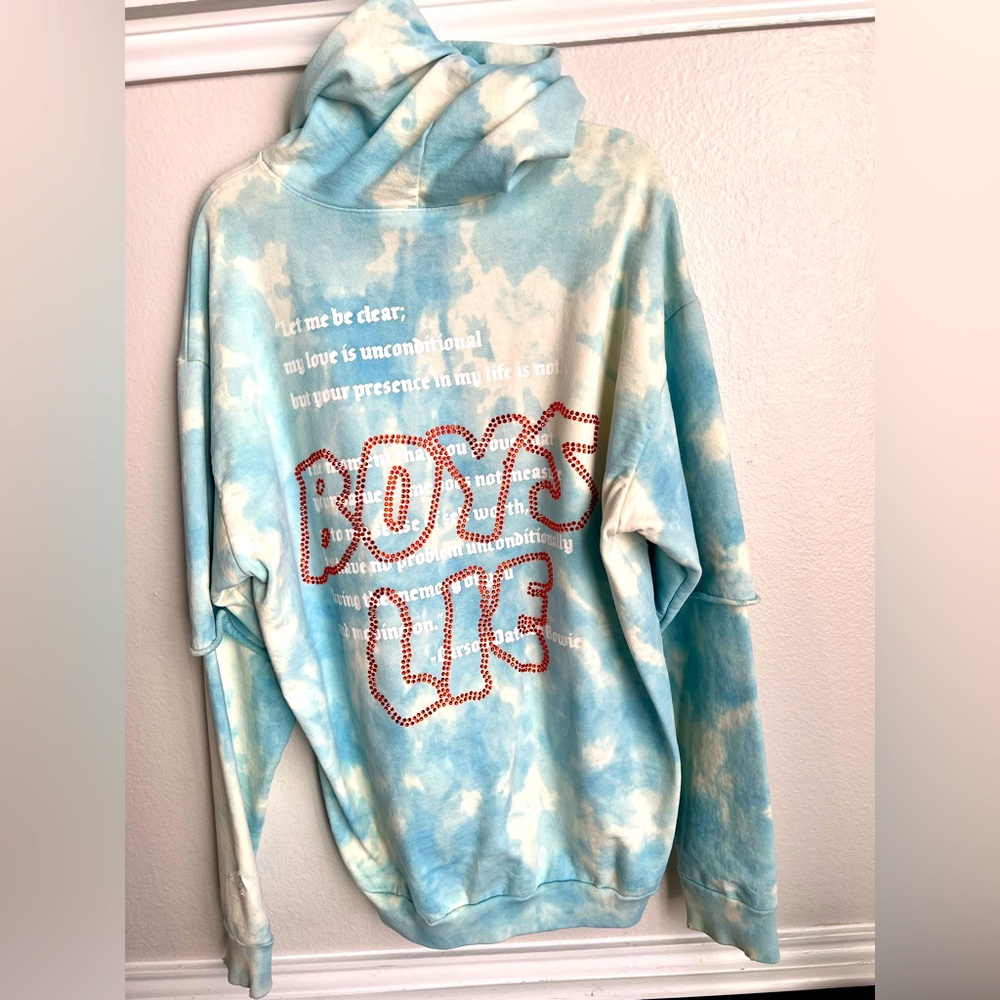 Oversized hoodie, Brand is Boys Lie with blue and white material with red stones